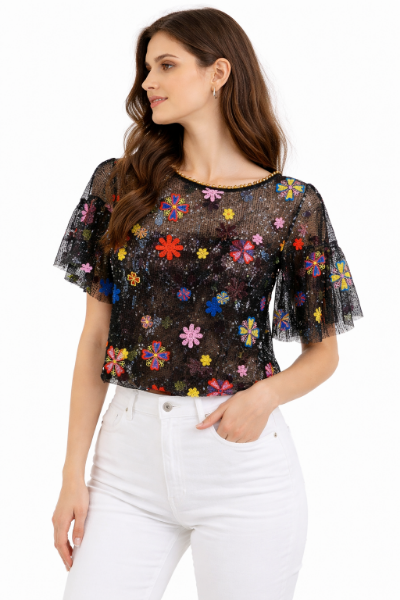 صورة بلوزة سوداء شفافة بزهور ملونة. (hanita)