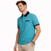 صورة قميص بولو فيروزي بنقشة عصرية (IN SIDE)